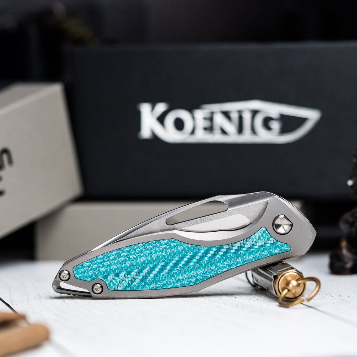 Drop Date (02/04): Koenig Arius Non - Flipper - Brightwashed w/ Polished Flats M390 & Aqua Teal Twill Inlay - URBAN EDC®