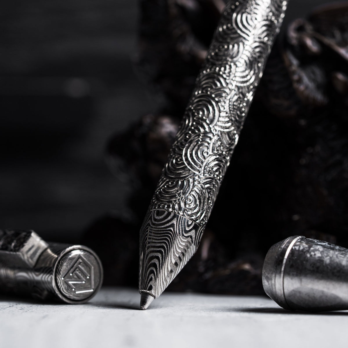 Drop Date (08/12): Nottingham Tactical x URBAN TiButton Single Lock Pen - Odin's Eye Damasteel w/ Chaos Seigaiha™ - URBAN EDC®