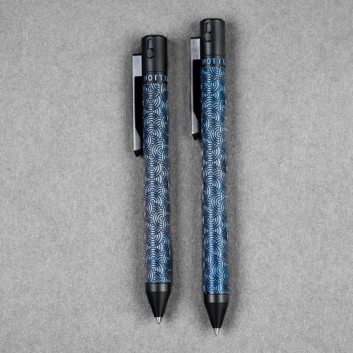 Nottingham Tactical x URBAN TiButton Single Lock Pen - Two - Tone Black Ti Cerakote & Blue Chaos Seigaiha w/ Milled Chaos Seigaiha Clip - URBAN EDC®